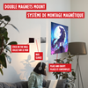 An advertisement image featuring a woman sitting on a sofa looking at art prints. Text highlights features of the Double Magnet Mounting System, showing magnets and a print on the wall indicating where to stick the magnet.