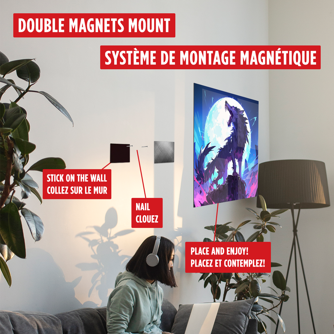 An advertisement image featuring a woman sitting on a sofa looking at art prints. Text highlights features of the Double Magnet Mounting System, showing magnets and a print on the wall indicating where to stick the magnet.